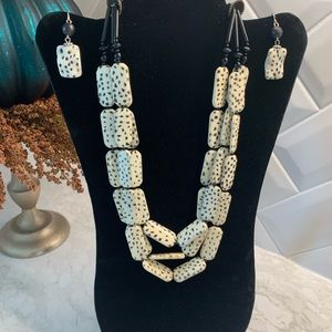 Fun animal print necklace with matching earrings.